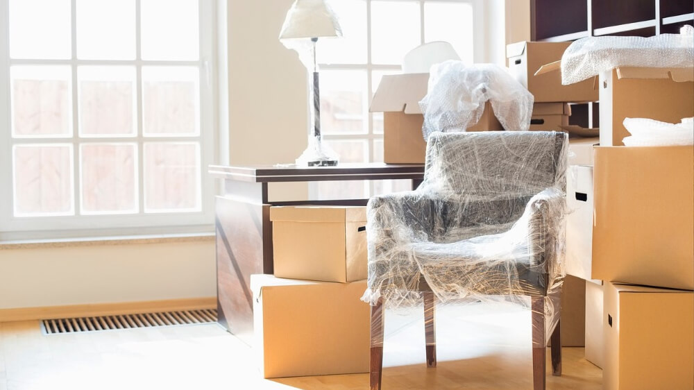 furniture and boxes in a room