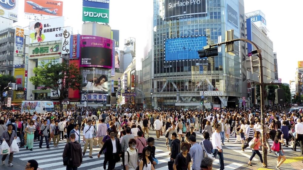 People is crossing an intersection in Shibuya