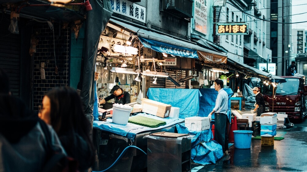 People working at Tsukiji outer market early in the morning