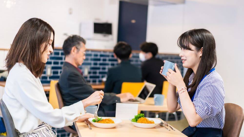 employees eat together at the office cafeteria